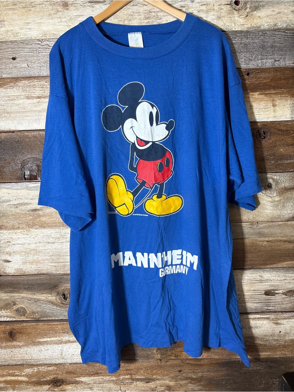 vintage blue Mickey Mouse graphic t-shirt featuring a "Mannheim Germany" design